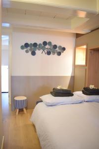 Een bed of bedden in een kamer bij Singel Residence