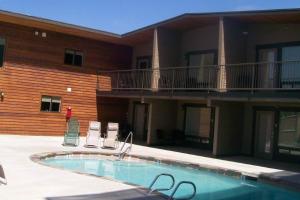 a swimming pool in front of a building at Cabana #11 in Chelan