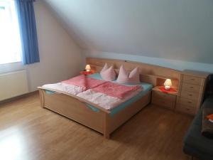 Cama o camas de una habitación en Ferienwohnung Poppe