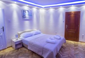 Postel nebo postele na pokoji v ubytování Apartments Vila Marija