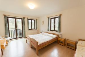 Postel nebo postele na pokoji v ubytování Holiday House Vitice 21