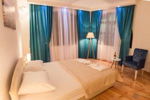 Postel nebo postele na pokoji v ubytování Apartments Vila Marija