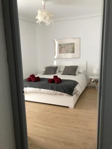 Posteľ alebo postele v izbe v ubytovaní HabitaHost Colón