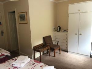 Voodi või voodid majutusasutuse Port Askaig Hotel toas