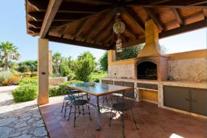 Patio alebo iná vonkajšia časť ubytovania Villa Athena