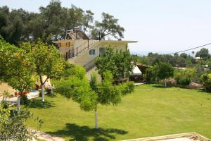 a view of the house from the garden at Villa Thomas Valtos beach in Parga