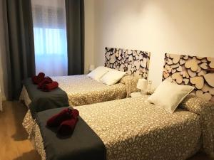 Posteľ alebo postele v izbe v ubytovaní HabitaHost Colón