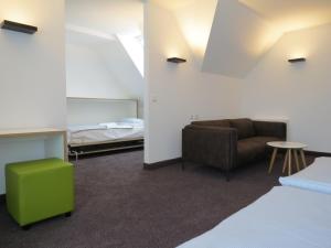 Postel nebo postele na pokoji v ubytování Comfor Hotel Ulm City
