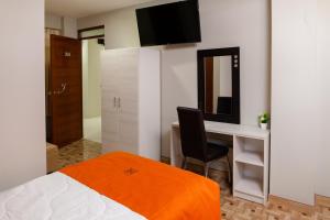 Postel nebo postele na pokoji v ubytování Mercé Hotel