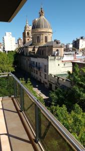 a view of a city from a balcony at Plaza López in Rosario