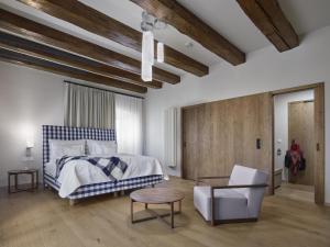 Postel nebo postele na pokoji v ubytování Lotrinský hotel