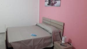 Voodi või voodid majutusasutuse B&b Domo e Nonna toas