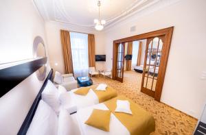TV a/nebo společenská místnost v ubytování Grandium Hotel Prague