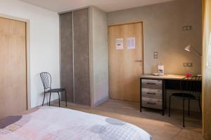 Postel nebo postele na pokoji v ubytování Homgaïa chambres d'hôtes