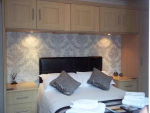 En eller flere senge i et værelse på Glenwood Guesthouse Betws-y-coed