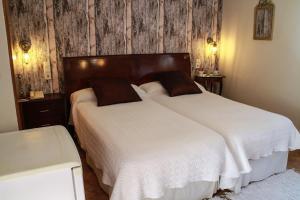 Postel nebo postele na pokoji v ubytování Hotel Iris La Eliana