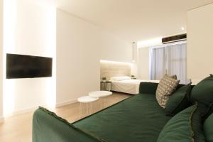 Televízia a/alebo spoločenská miestnosť v ubytovaní High-End Luxury Apartment 2