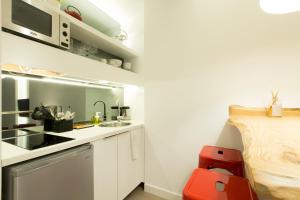 Kuchyňa alebo kuchynka v ubytovaní High-End Luxury Apartment 2