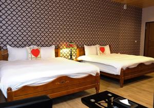 Postel nebo postele na pokoji v ubytování Chu Dream Hostel