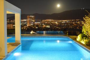 The swimming pool at or close to Athens Lycabettus Hill Penthouse, Private Roof Garden & Pool