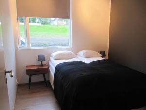 Letto o letti in una camera di Seydisfjördur Apartment