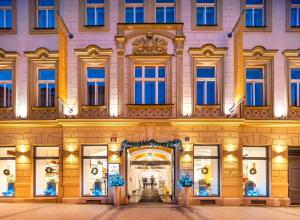 eine Darstellung der Vorderseite eines Hotels in der Unterkunft Grandium Hotel Prague in Prag