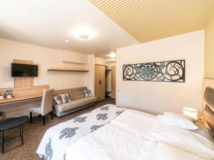 Posteľ alebo postele v izbe v ubytovaní Hotel Zakopane Wellness & SPA ex Korona Tatr