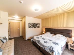 Posteľ alebo postele v izbe v ubytovaní Hotel Zakopane Wellness & SPA ex Korona Tatr