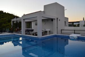 The swimming pool at or close to Athens Lycabettus Hill Penthouse, Private Roof Garden & Pool