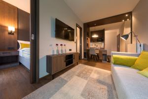 TV a/nebo společenská místnost v ubytování Hotel Smartino