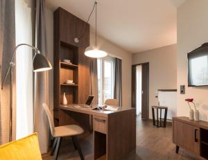 Kuchyň nebo kuchyňský kout v ubytování Hotel Smartino