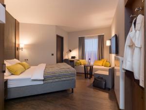 Postel nebo postele na pokoji v ubytování Hotel Smartino