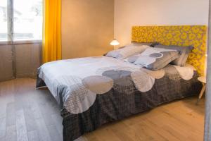 Postel nebo postele na pokoji v ubytování Homgaïa chambres d'hôtes