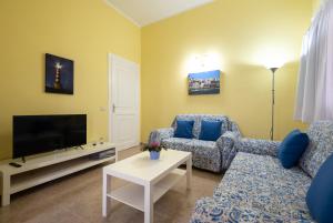 TV a/nebo společenská místnost v ubytování Apartamento Vista Farallón