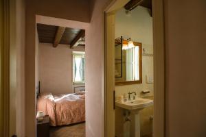 Postel nebo postele na pokoji v ubytování Agriturismo Colle Tocci