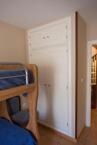 Кровать или кровати в номере Apartamento Solárium