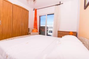 Posteľ alebo postele v izbe v ubytovaní Apartmani MM