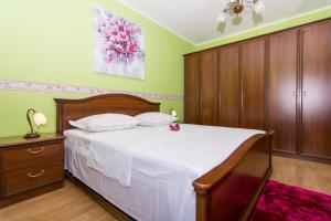 Posteľ alebo postele v izbe v ubytovaní Apartmani MM