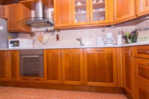 Kuchyňa alebo kuchynka v ubytovaní Apartmani MM