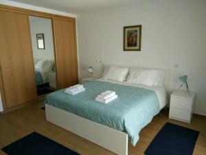 Ribalta Beach Houses客房内的一张或多张床位