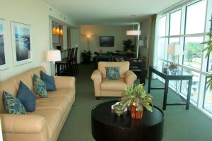 a living room with a couch and a table at Seaside Resort by Capital Vacations in Myrtle Beach