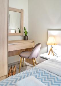 Postel nebo postele na pokoji v ubytování Lemar Luxury Apartments