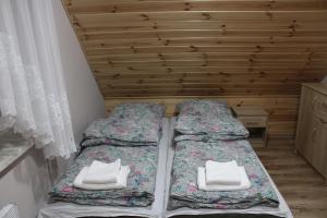 Posteľ alebo postele v izbe v ubytovaní PRZYSTAŃ NAD BOBREM