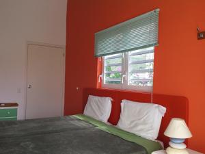 A bed or beds in a room at Heliemar
