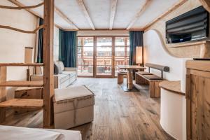 Et sittehjørne på Dolomites Living Hotel Tirler