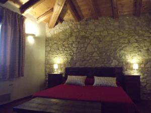 Postel nebo postele na pokoji v ubytování Casa della Fornace