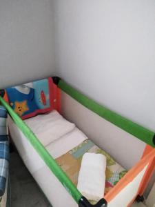 A bed or beds in a room at BeHouse Avenida