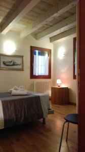Ένα ή περισσότερα κρεβάτια σε δωμάτιο στο San Marco Venice Apartment +23 φωτογραφίες