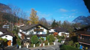 an aerial view of a house in a village at Yeti Lux - Panoramic Loft in Garmisch-Partenkirchen