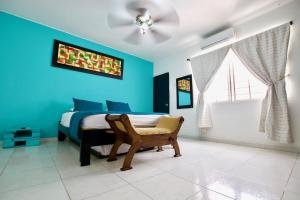 Χώρος καθιστικού στο QuillaHost Tropical Apartment